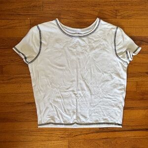 White hollister baby tee with black stitching